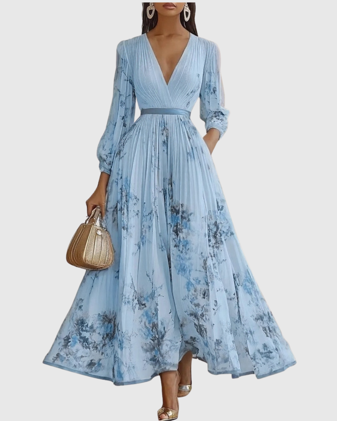 Woman wearing a light blue floral dress with long sleeves on a white background