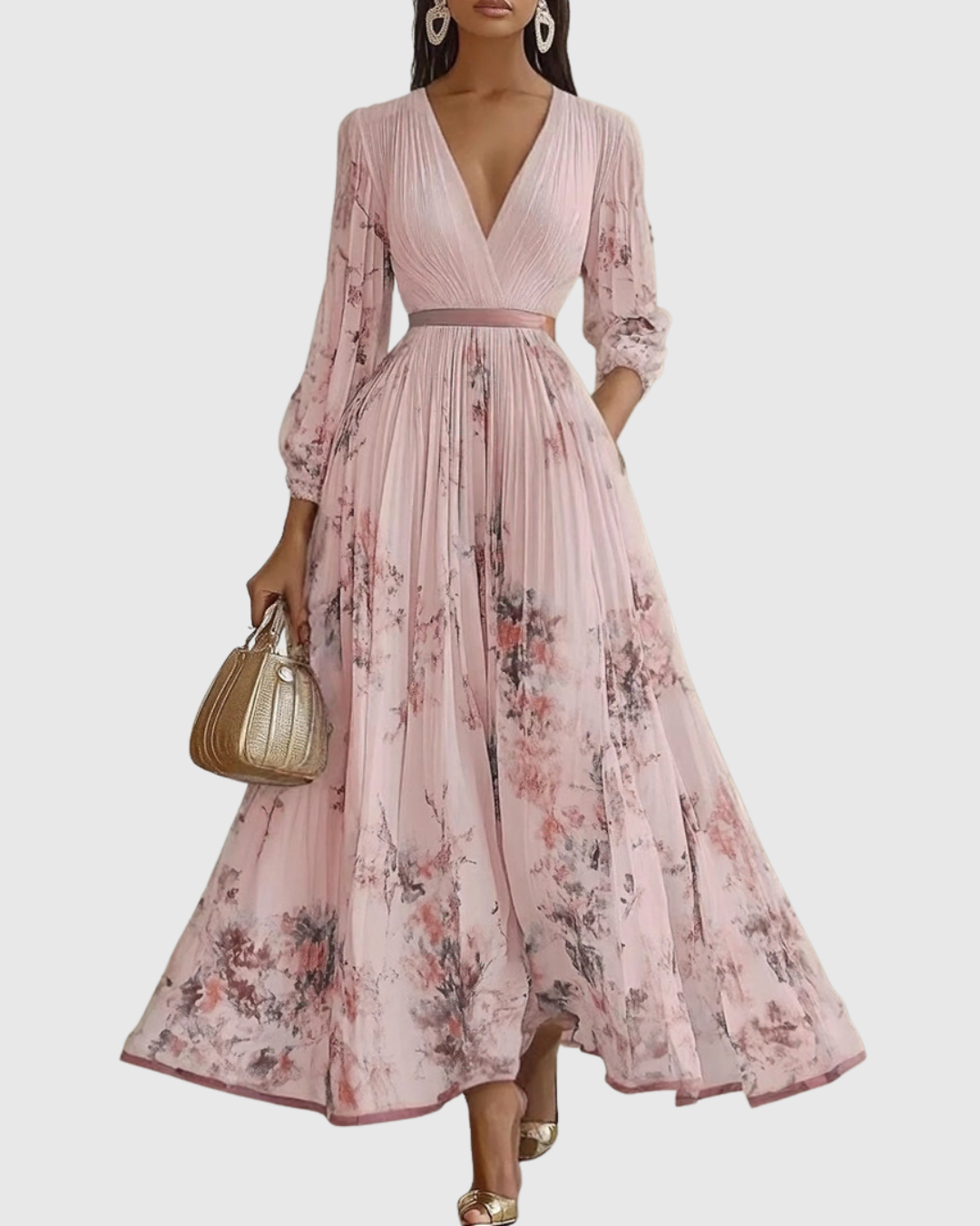 Pink floral dress worn by a model on a white background