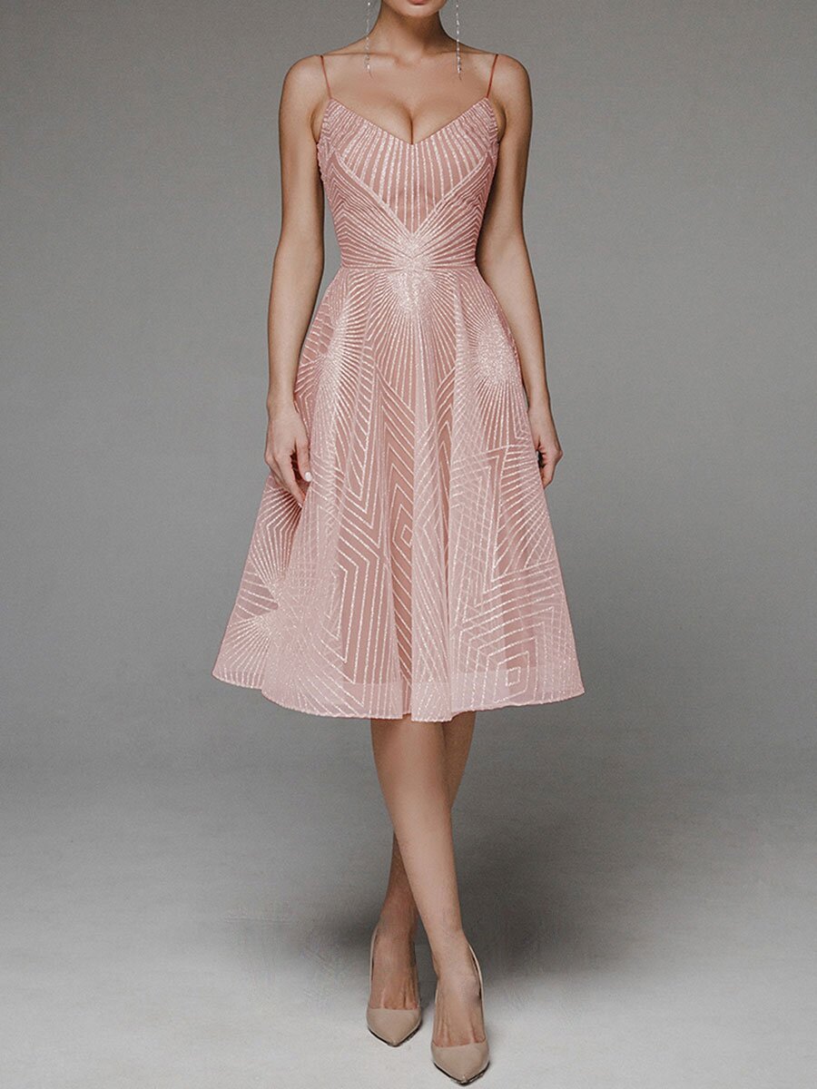 Pink dress with geometric pattern on a gray background