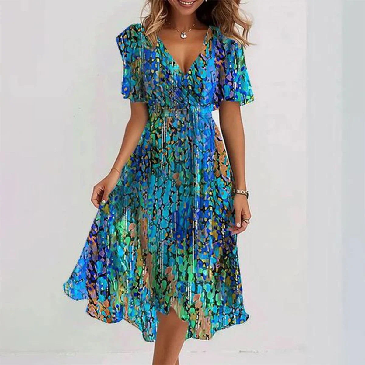 Woman wearing a blue floral dress on a white background
