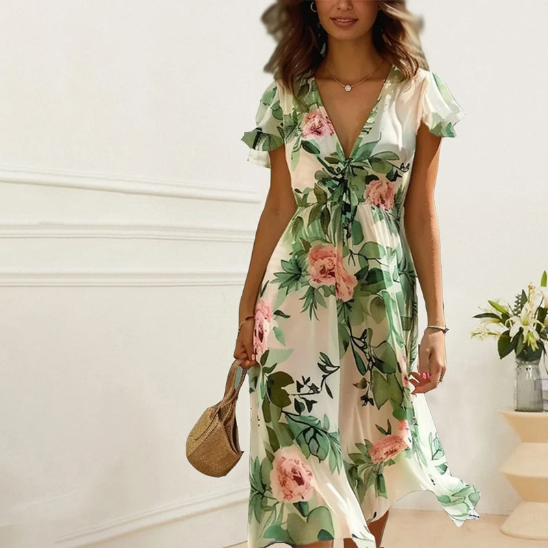 Woman wearing a floral dress with a white background
