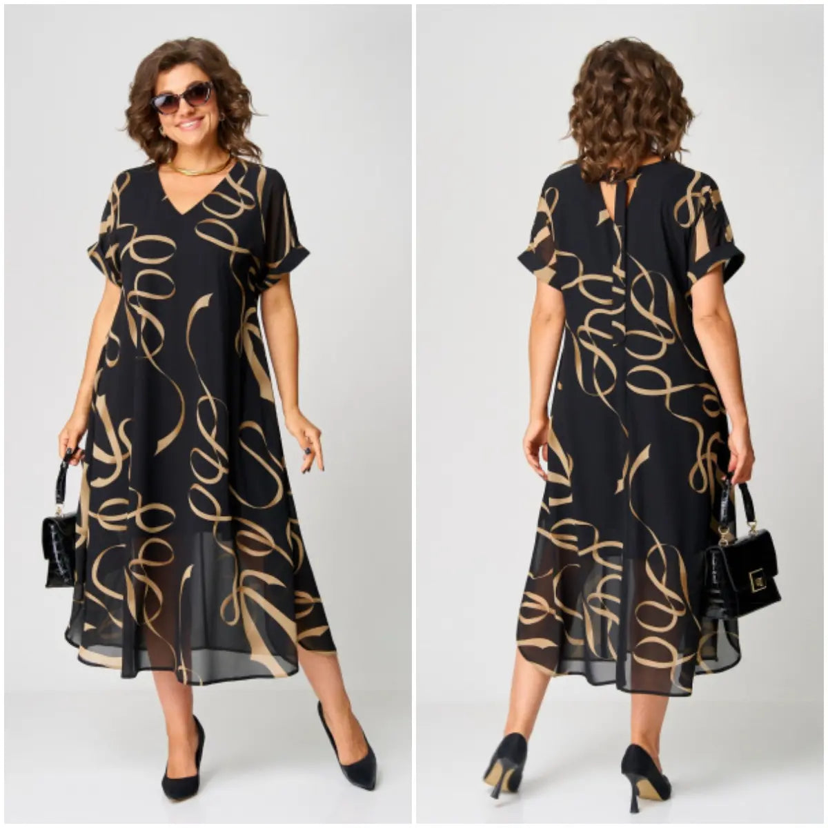 Woman wearing a black dress with gold patterns, holding a handbag on a white background