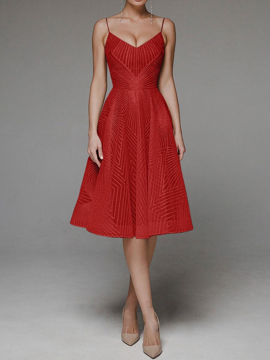 Red dress with geometric pattern on a gray background
