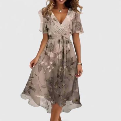 Woman wearing a floral dress on a white background