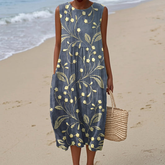 Woman wearing a floral dress on a beach