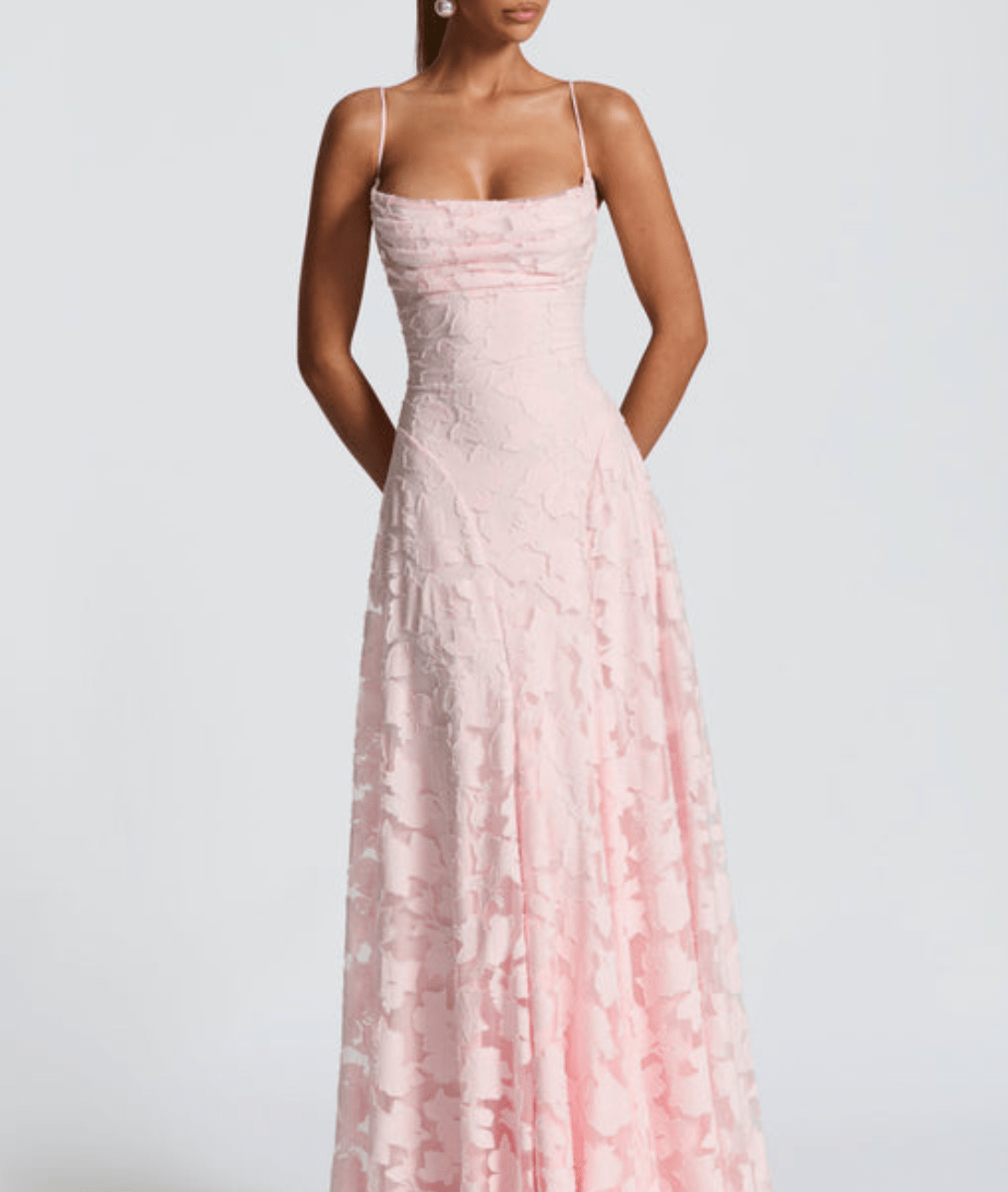 Pink lace dress on a white background