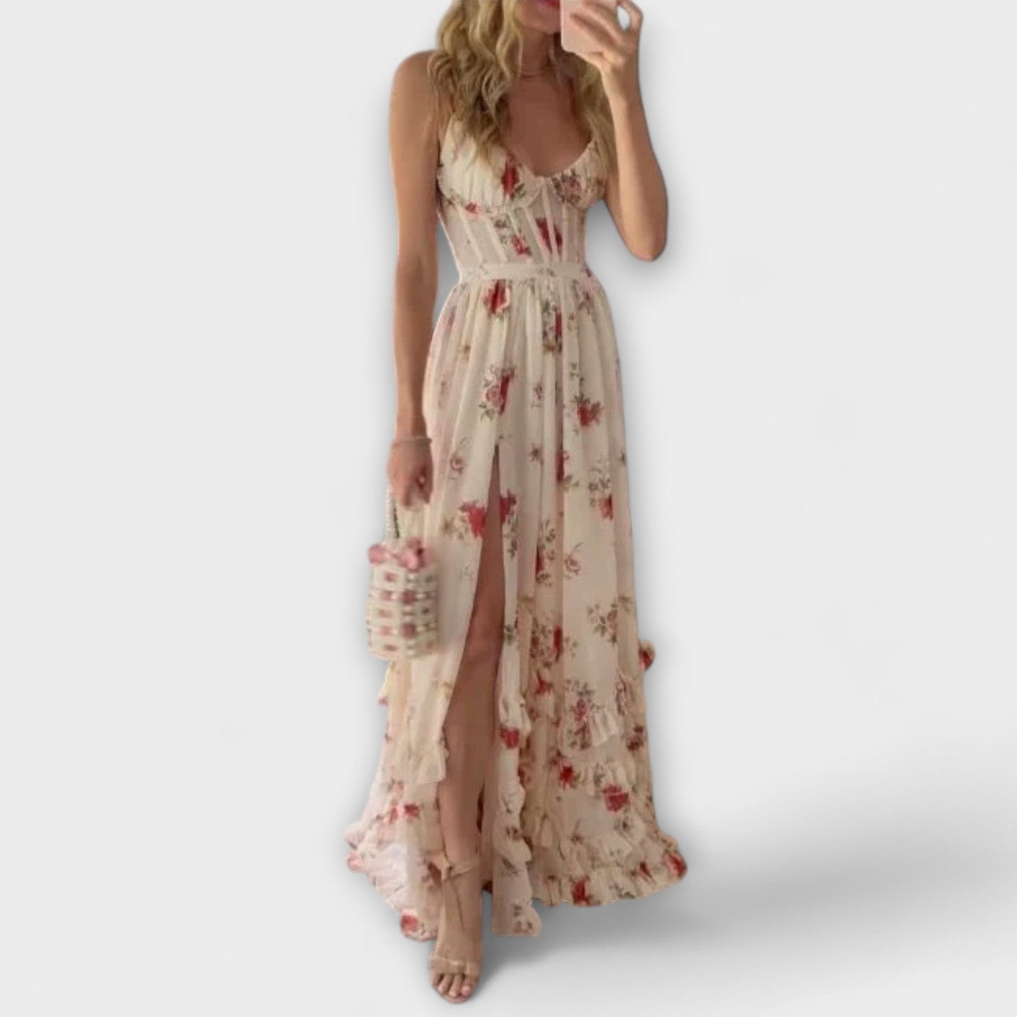 Woman wearing a floral dress with a white background