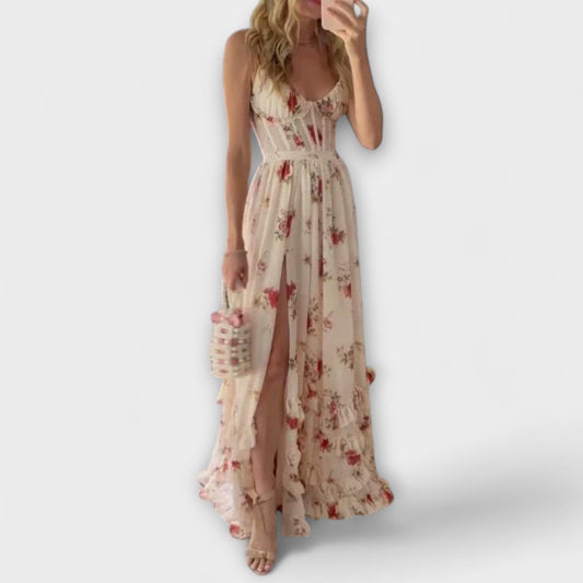 Woman wearing a floral dress with a white background