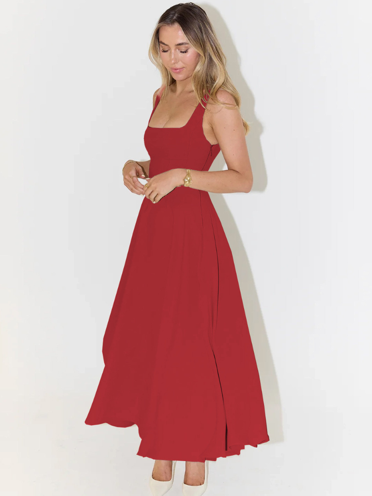 Woman wearing a red dress on a white background