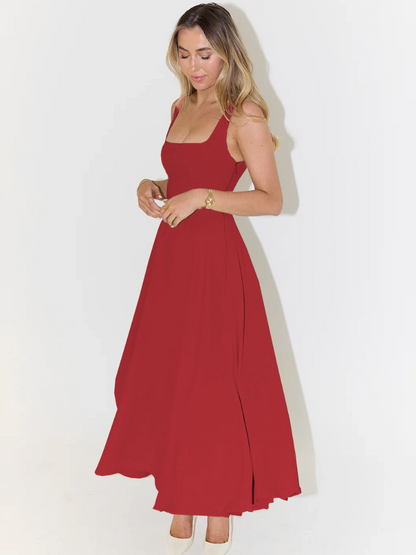 Woman wearing a red dress on a white background