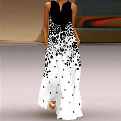 Woman wearing a black and white floral dress with a blurred background