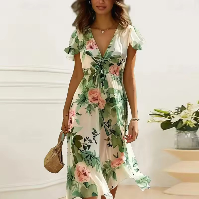 Woman wearing a floral dress with a white background