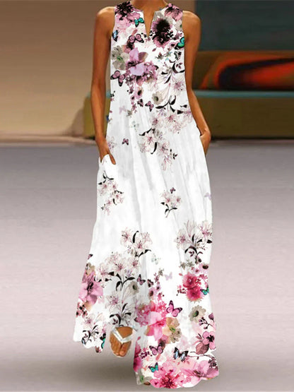 White dress with floral and butterfly patterns on a neutral background