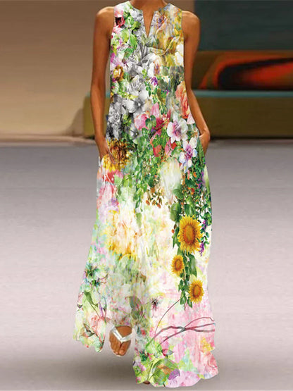 Woman wearing a floral dress with a colorful pattern on a neutral background
