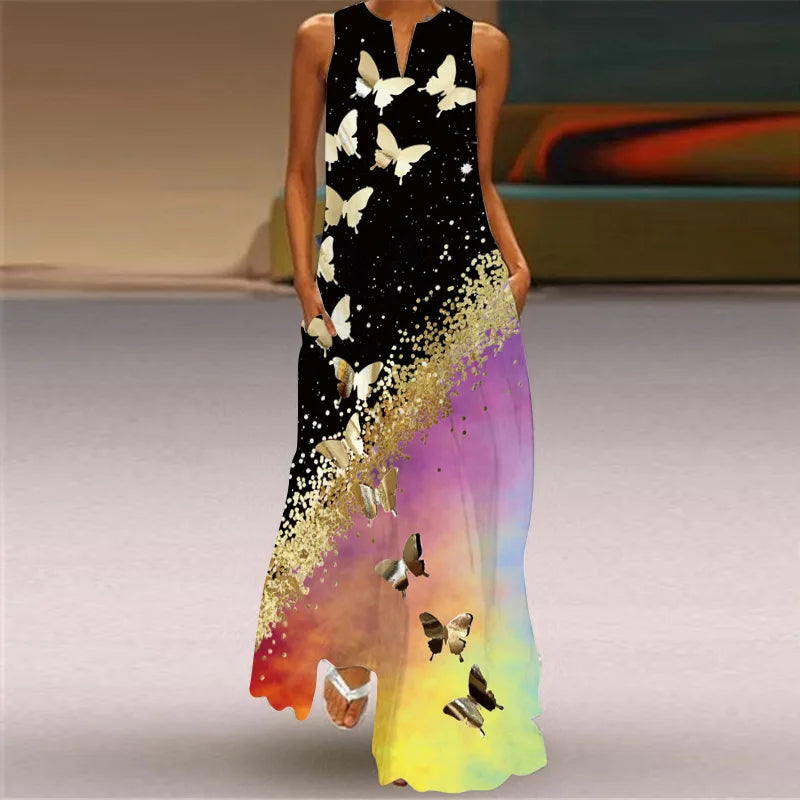 Long dress with butterfly pattern transitioning from black to colorful at the bottom