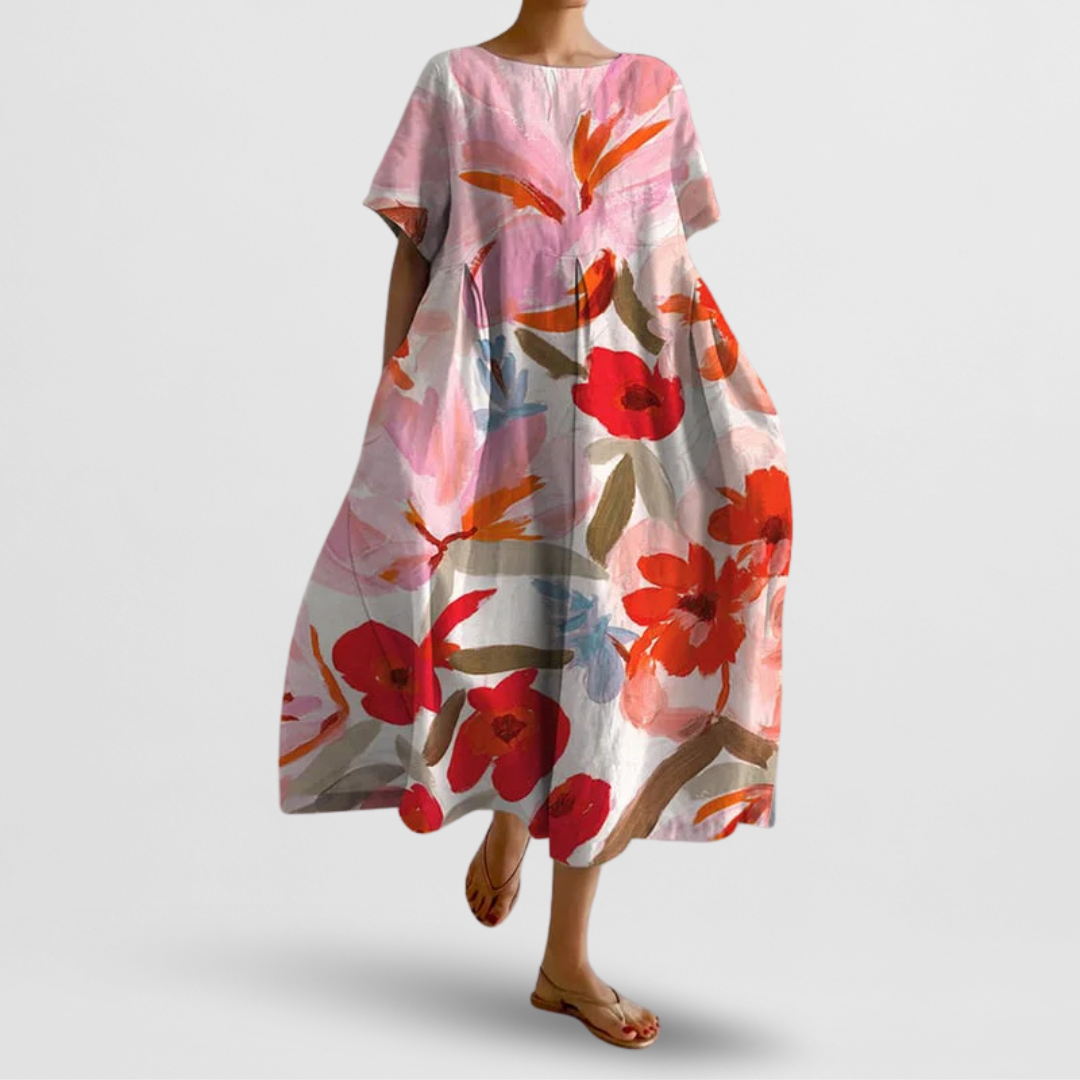 Floral dress with red and orange flowers on a plain background