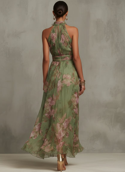 Woman wearing a green floral dress against a neutral background