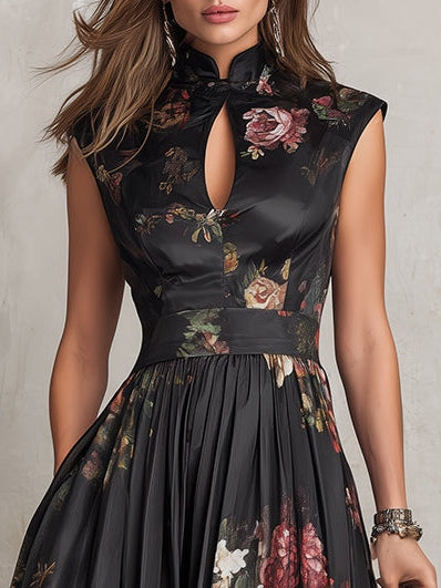 Black floral dress worn by a model against a neutral background