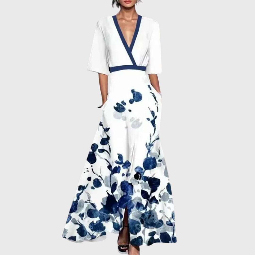 White dress with blue floral pattern on a white background