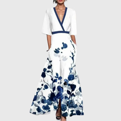 White dress with blue floral pattern on a white background