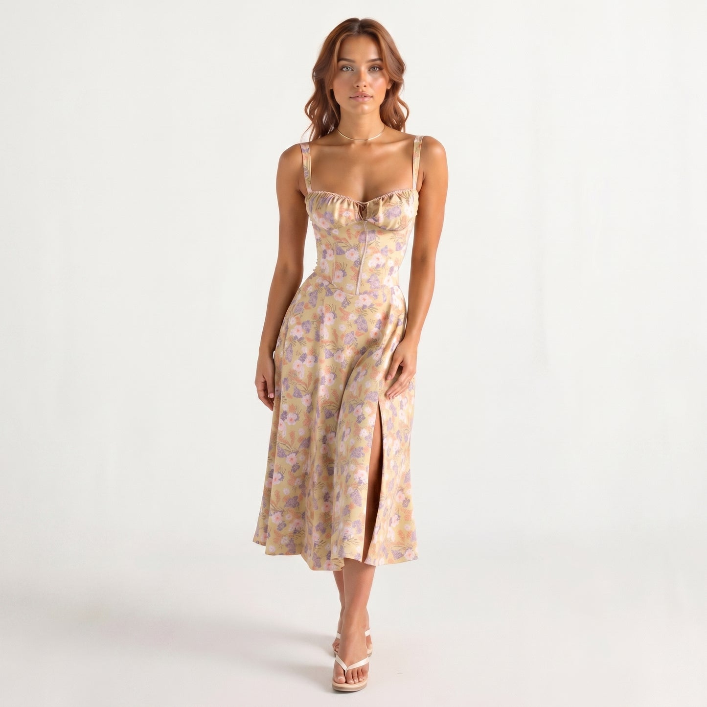 Woman wearing a floral dress on a white background
