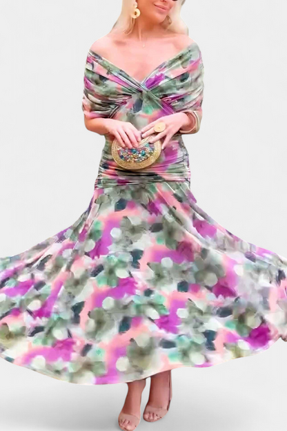 Woman wearing a colorful floral dress with a white background