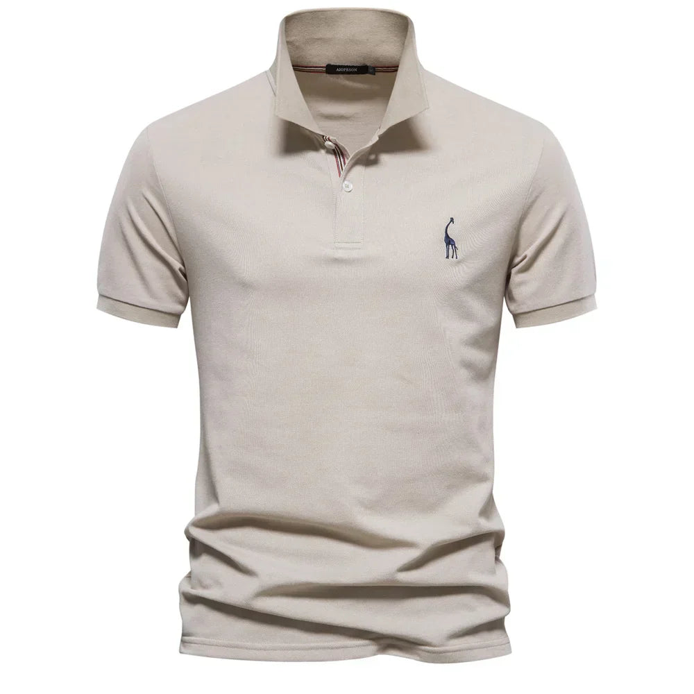 Beige polo shirt with a small logo on a white background