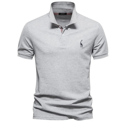 Gray polo shirt with a small logo on a white background