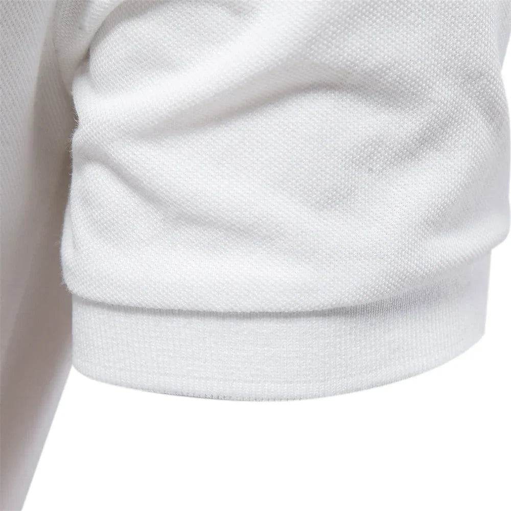 Close-up of a white textured fabric sleeve on a plain background