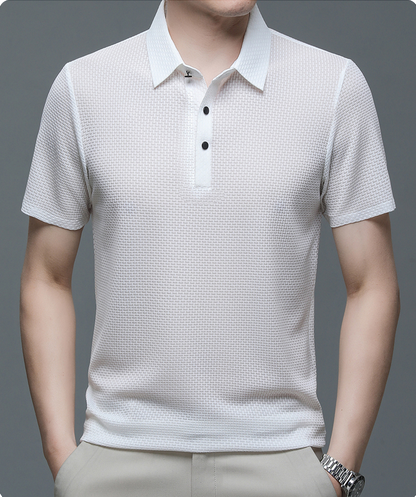 White textured polo shirt worn by a person on a gray background