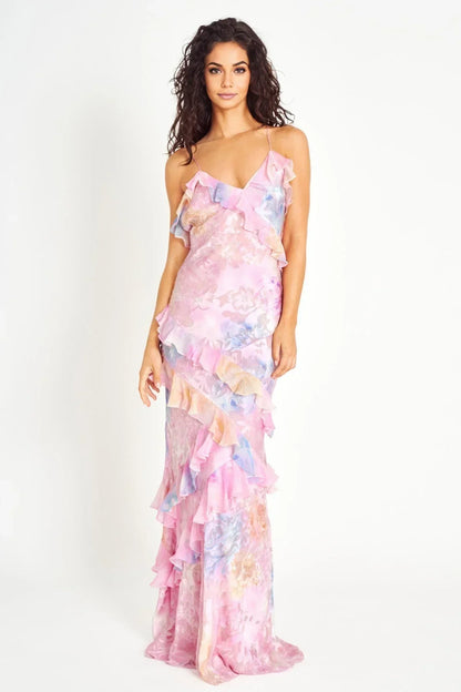 Woman wearing a floral dress on a white background