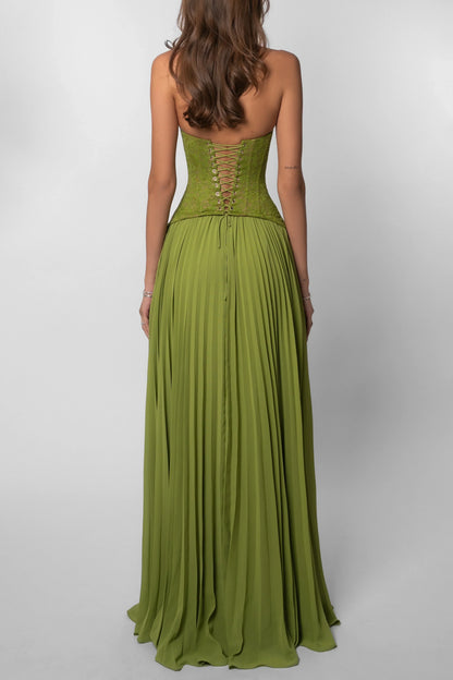 Green strapless gown with lace-up back on a white background