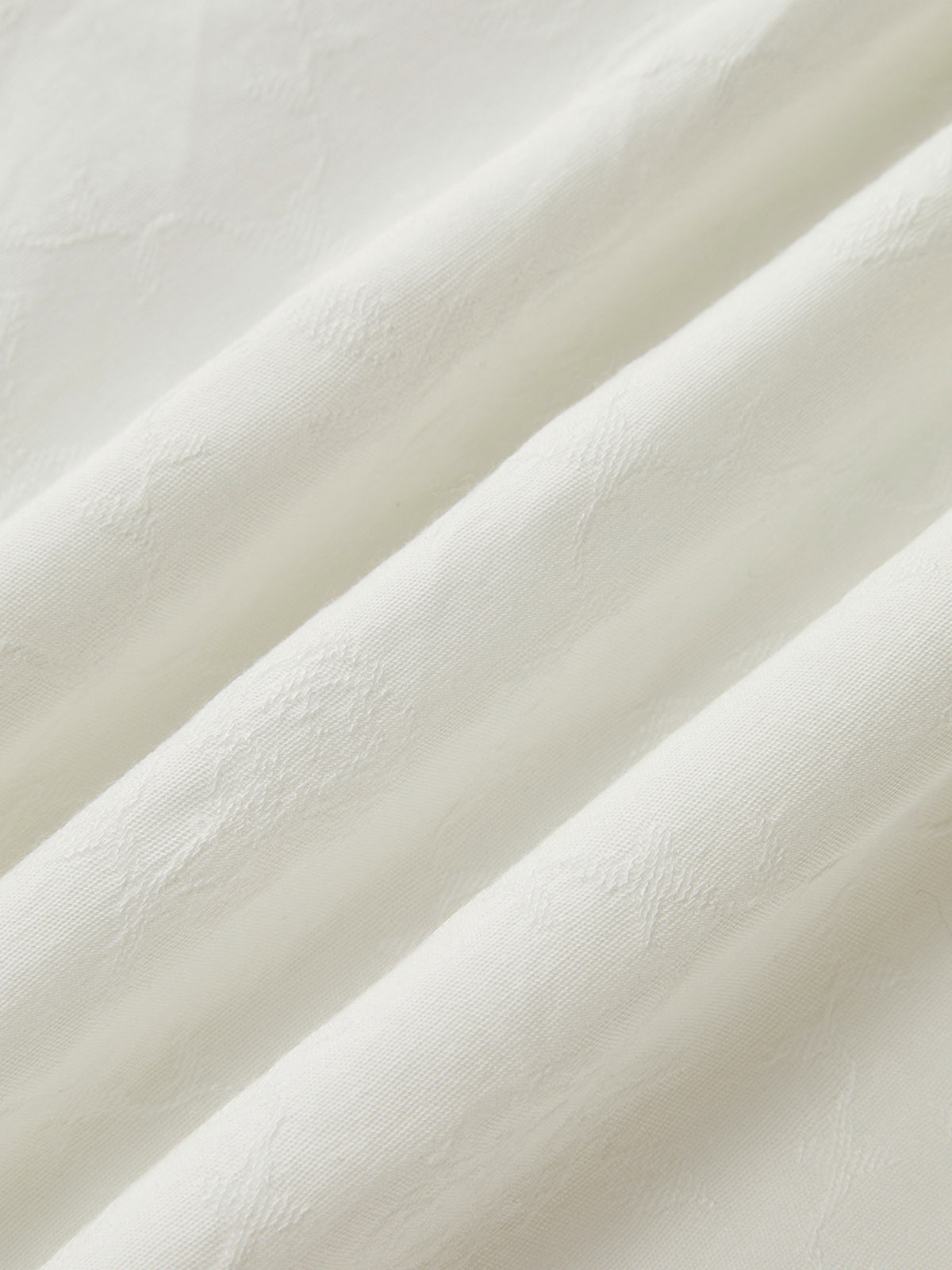 Close-up of white fabric with a soft texture