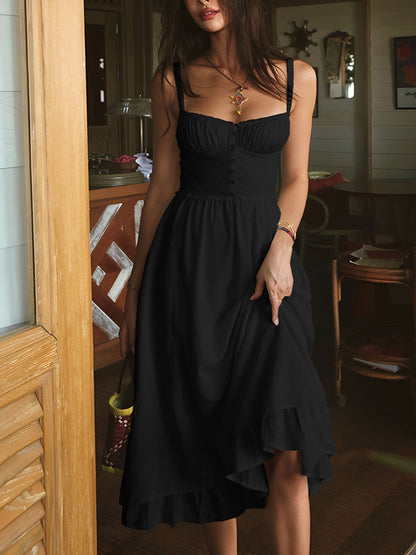 Woman wearing a black dress in an indoor setting