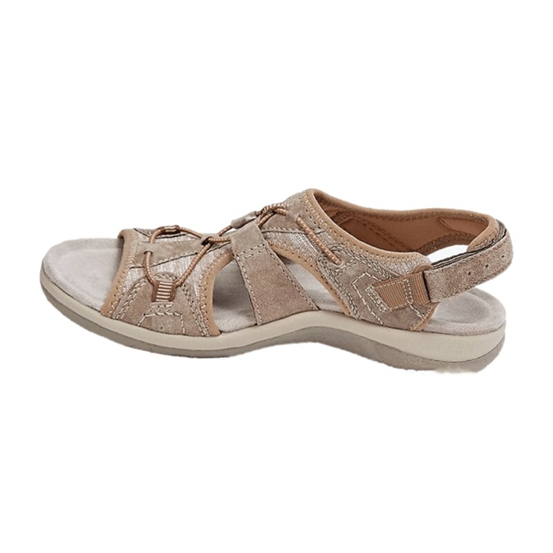 Beige sandal with multiple straps on a white background