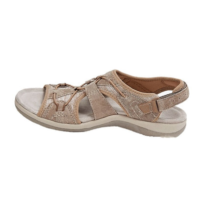 Beige sandal with multiple straps on a white background