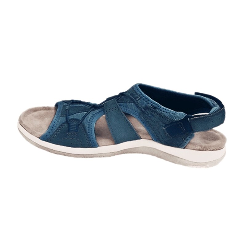 Blue sandal with a white sole on a white background