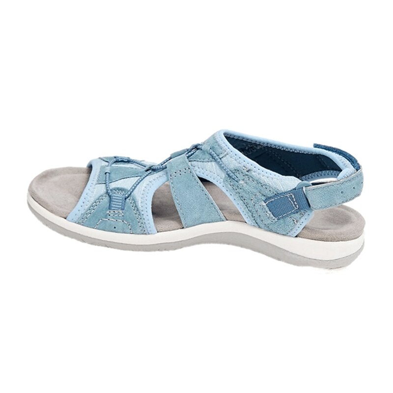 Blue sandal with a white sole on a white background