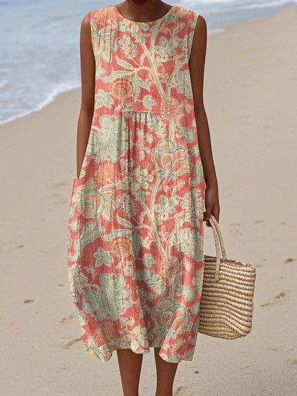 Woman wearing a floral dress on a beach